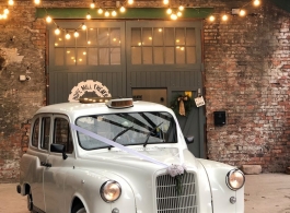 Classic London taxi for Manchester weddings